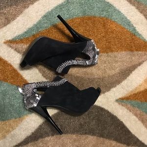 Black suede platform heels by Guess size 6